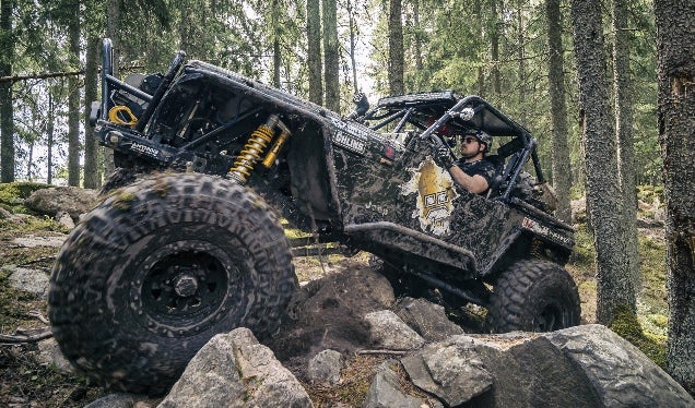 black-jeep-wrangler-trees-climbing-rock-636x374-web.jpg