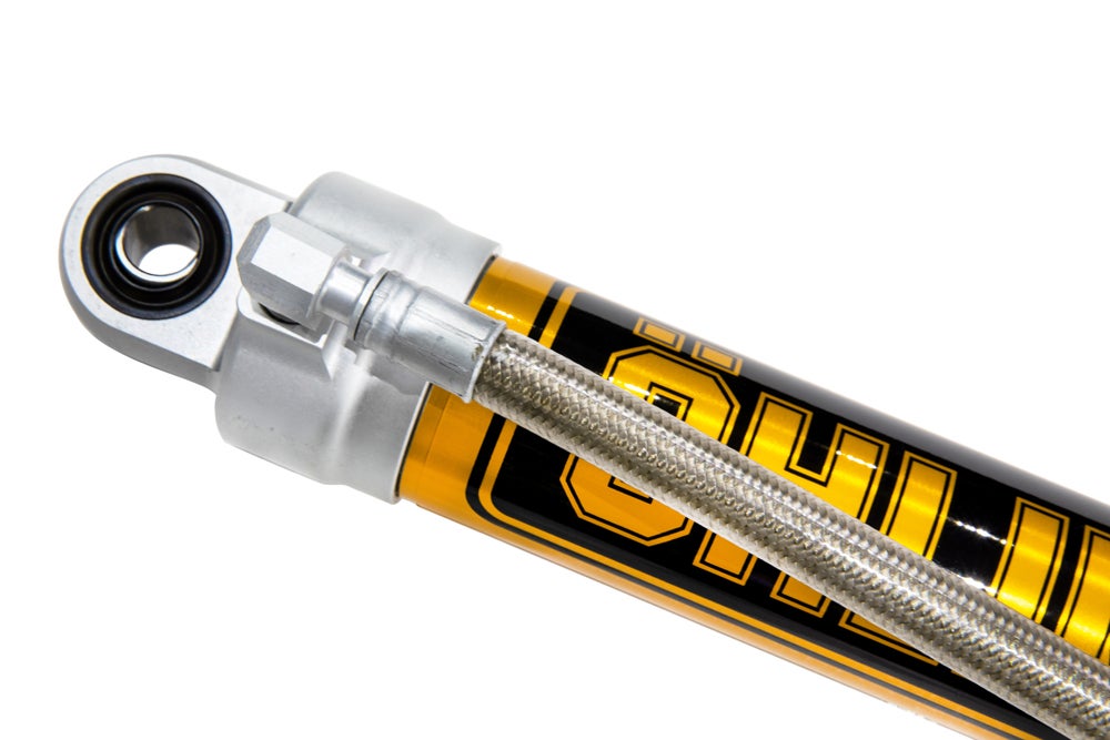 Öhlins shock lower mount and braided reservoir line detail
