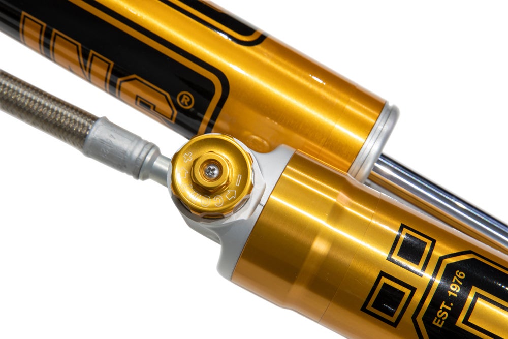 Öhlins damping adjuster knob and remote reservoir detail