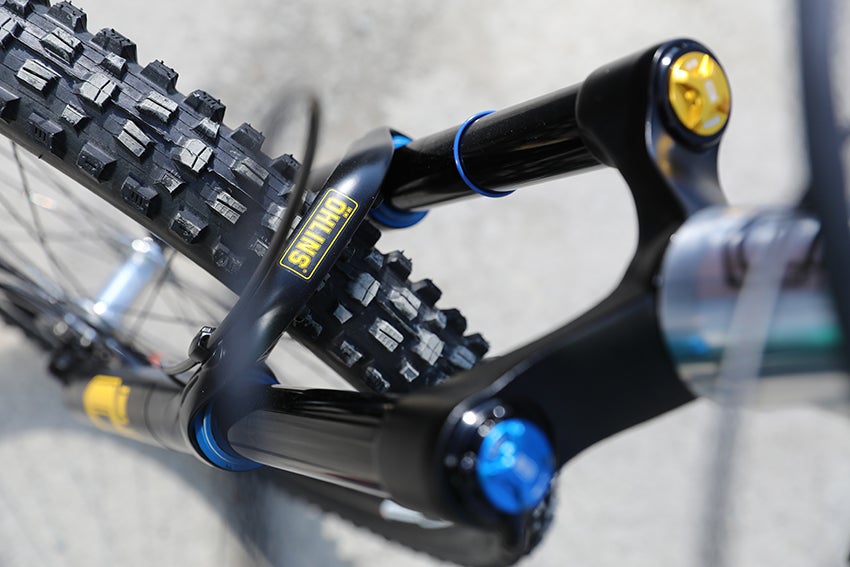 A view from the top of an Öhlins front fork, installed on a Commencal Meta bike.