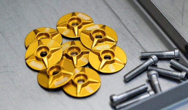 ohlins-mtb-factory-racing-top-cap-gold-636x374-web.jpg